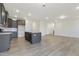 Open floor plan seamlessly connects the kitchen and living area, promoting an easy flow at 304 Ford Meadows Dr, Garner, NC 27529