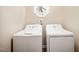 This practical laundry area features a standard washer and dryer, providing convenience for household chores at 304 S Smith St, Clayton, NC 27520