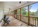 Relaxing porch area features a wooden frame, a hammock, and outdoor seating offering a perfect retreat at 304 S Smith St, Clayton, NC 27520