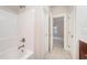A bathroom features a shower and a door into another room at 307 Millbrook Dr, Pittsboro, NC 27312