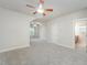 A spacious bedroom featuring a view into a bathroom at 307 Millbrook Dr, Pittsboro, NC 27312