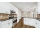 Well-equipped kitchen with stainless steel appliances and white cabinets at 307 Millbrook Dr, Pittsboro, NC 27312
