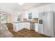 Bright kitchen features stainless steel appliances and a breakfast bar at 307 Millbrook Dr, Pittsboro, NC 27312