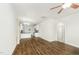 Bright living room showcasing hardwood floors and an open floor plan at 307 Millbrook Dr, Pittsboro, NC 27312