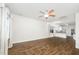 Open-concept living room featuring hardwood floors and a ceiling fan at 307 Millbrook Dr, Pittsboro, NC 27312