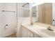 Bathroom with a double sink vanity and mirrored wall at 307 Sunset Dr, Elon, NC 27244