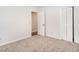 Bedroom with carpet and closet with bi-fold doors at 307 Sunset Dr, Elon, NC 27244