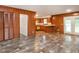 Open living room leading into the kitchen and patio at 307 Sunset Dr, Elon, NC 27244