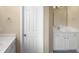 Bathroom featuring white cabinets and a sink at 3116 Kirby St, Durham, NC 27713