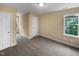 Spacious bedroom with neutral carpeting and a window letting in plenty of natural light at 3116 Kirby St, Durham, NC 27713