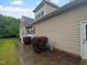 Charming house with vinyl siding, manicured shrubbery, and a neatly maintained lawn, creating inviting curb appeal at 3116 Kirby St, Durham, NC 27713