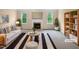 Bright living room with fireplace, large windows, and stylish modern decor at 3116 Kirby St, Durham, NC 27713