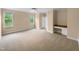 Spacious main bedroom with a built-in desk and ample natural light at 3116 Kirby St, Durham, NC 27713