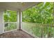 Relaxing balcony surrounded by lush greenery, offering a private outdoor space to unwind at 324 Waterford Lake Dr, Cary, NC 27519
