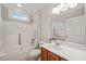 Bathroom features a shower/tub combo, a single vanity and a large mirror at 324 Waterford Lake Dr, Cary, NC 27519