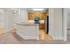 Beautiful kitchen features stainless steel appliances, ample cabinet space and an open plan to the living room at 324 Waterford Lake Dr, Cary, NC 27519
