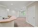 View of a living area with granite countertops, open layout, and ample space at 324 Waterford Lake Dr, Cary, NC 27519