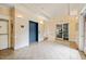 Spacious lobby with tile flooring, elevator access, and sliding glass doors at 324 Waterford Lake Dr, Cary, NC 27519