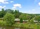 Scenic street view of the neighborhood's landscape with lush greenery and foliage at 324 Waterford Lake Dr, Cary, NC 27519