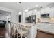 Bright kitchen with stainless steel appliances, granite countertops, and a kitchen island at 369 Roberts Ridge Dr, Cary, NC 27513