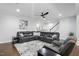 Inviting living room boasts a sectional sofa, creating a cozy space for relaxation and entertainment at 369 Roberts Ridge Dr, Cary, NC 27513