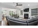 Comfortable living room with a fireplace and built-in shelves, perfect for relaxing or entertaining guests at 369 Roberts Ridge Dr, Cary, NC 27513
