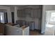 Unfinished kitchen with gray cabinets providing a blank canvas for customization at 39 Braddock Ct, Garner, NC 27529