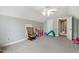 Spacious bedroom with vaulted ceiling, ceiling fan, and doors to other rooms at 40 Breckenridge Pl, Dunn, NC 28334