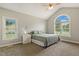 Bedroom features vaulted ceilings, a large window, and plush carpeting at 40 Breckenridge Pl, Dunn, NC 28334