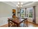Dining room boasts natural light and a view of the landscaped backyard at 40 Breckenridge Pl, Dunn, NC 28334