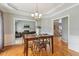 Dining room offers seamless flow into the living room and staircase at 40 Breckenridge Pl, Dunn, NC 28334
