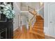 Grand foyer with hardwood floors, staircase, and plenty of natural light at 40 Breckenridge Pl, Dunn, NC 28334