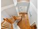 Grand foyer with hardwood floors, staircase, and a front door with glass panes, offering a welcoming entrance at 40 Breckenridge Pl, Dunn, NC 28334