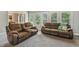 Cozy living room featuring comfortable seating and neutral carpeting at 40 Breckenridge Pl, Dunn, NC 28334