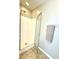 Clean, bright bathroom with a glass-enclosed shower and a convenient towel rack at 411 Joneshaven Dr, Fuquay Varina, NC 27526
