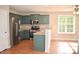 Well-lit kitchen with modern appliances and ample counter space for meal preparation at 411 Joneshaven Dr, Fuquay Varina, NC 27526
