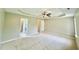 Spacious main bedroom with neutral carpet, ceiling fan, and recessed lighting at 411 Joneshaven Dr, Fuquay Varina, NC 27526