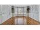 Elegant dining area with bay window, hardwood floors, white trim and ample natural light at 419 Jera Dr, Garner, NC 27529