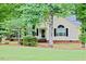 Front yard of a home featuring well-maintained landscaping and a welcoming entrance at 419 Jera Dr, Garner, NC 27529