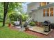 Backyard patio includes a grill, outdoor seating, and ample space for entertaining at 4329 Hawksong Pl, Cary, NC 27518