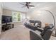 Cozy living room with a comfortable couch, chair, and a flat-screen TV at 4329 Hawksong Pl, Cary, NC 27518