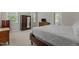 Serene bedroom with neutral carpeting, offering a peaceful retreat with natural light from two windows at 4416 Thistlehill Ct, Raleigh, NC 27616