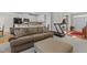 Comfortable living room with views of the kitchen and front entry at 4416 Thistlehill Ct, Raleigh, NC 27616