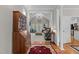 Open concept living room featuring vaulted ceiling, large windows and neutral tones at 4416 Thistlehill Ct, Raleigh, NC 27616