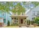 Charming two-story home featuring a welcoming front porch and beautifully maintained landscaping at 4605 All Points View Way, Raleigh, NC 27614