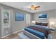 Nicely furnished bedroom features stylish decor and carpet flooring at 4658 Fawnbrook Cir, Raleigh, NC 27612