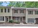 Charming townhome featuring neutral siding, brick accents, and well-maintained landscaping at 4658 Fawnbrook Cir, Raleigh, NC 27612