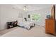 Bedroom featuring neutral colors and a serene atmosphere with ample natural light and stylish decor at 5 Providence Ridge Ln, Durham, NC 27713