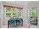 Sunlit breakfast nook featuring an outdoor view, perfect for casual dining at 5 Providence Ridge Ln, Durham, NC 27713