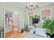 Home office with hardwood floors, natural light, and views into other rooms at 5 Providence Ridge Ln, Durham, NC 27713